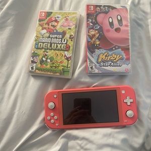Nintendo switch lite and 2 games